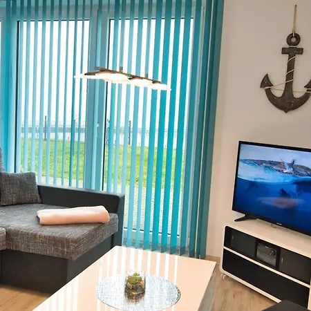 Appartement Ferienhaushaelfte 